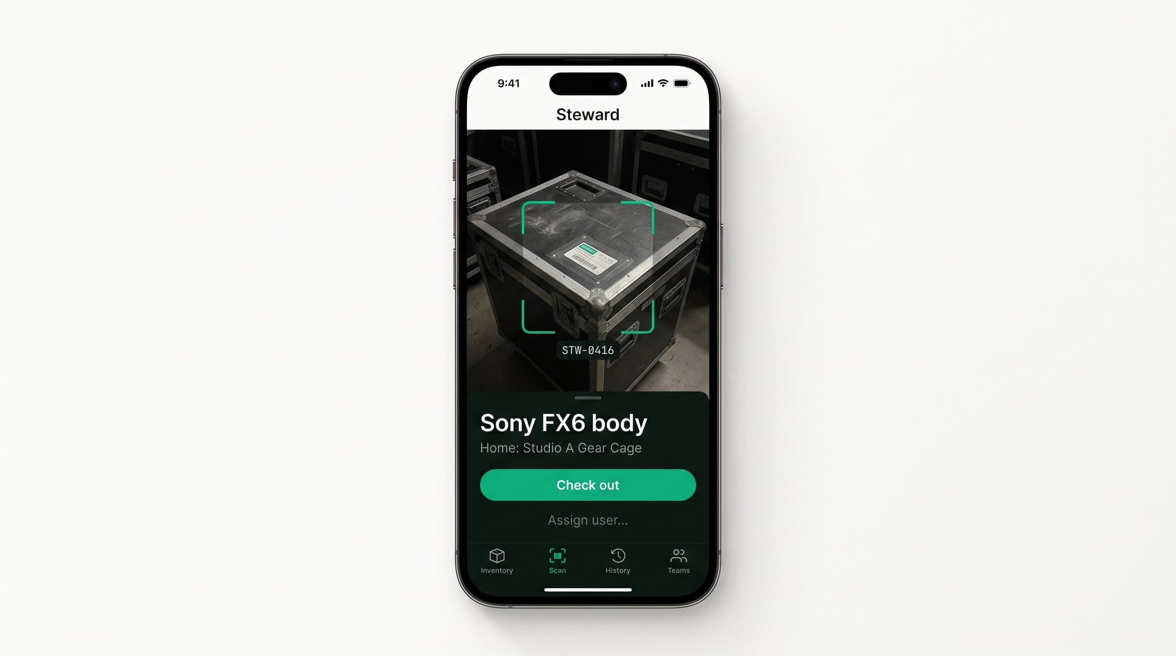 Phone running the Steward scan screen, with a QR asset tag framed in the viewfinder and the matching item resolving underneath
