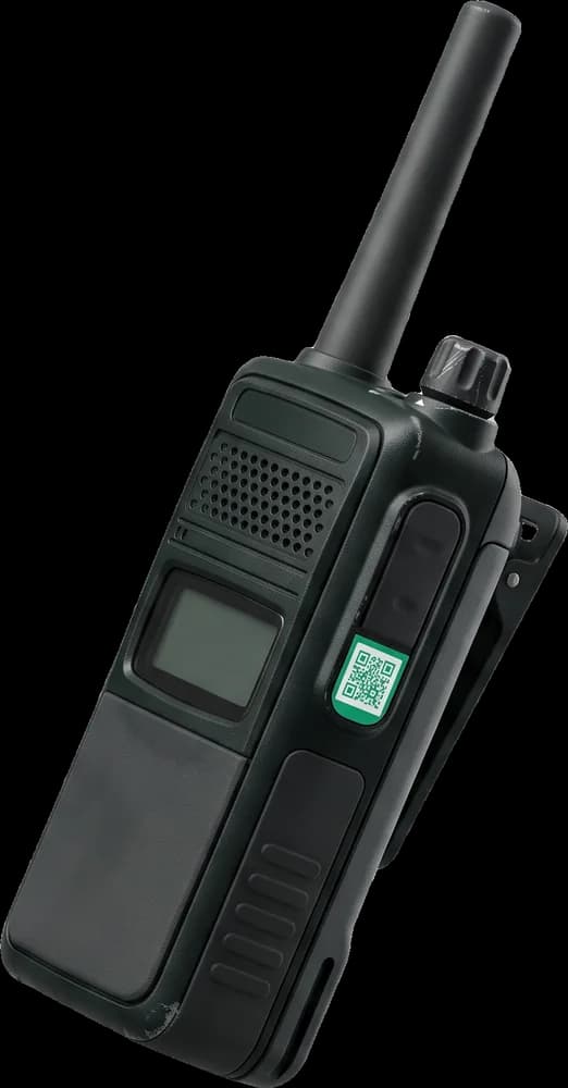 Two-way radio standing upright, tagged with an emerald QR asset tag